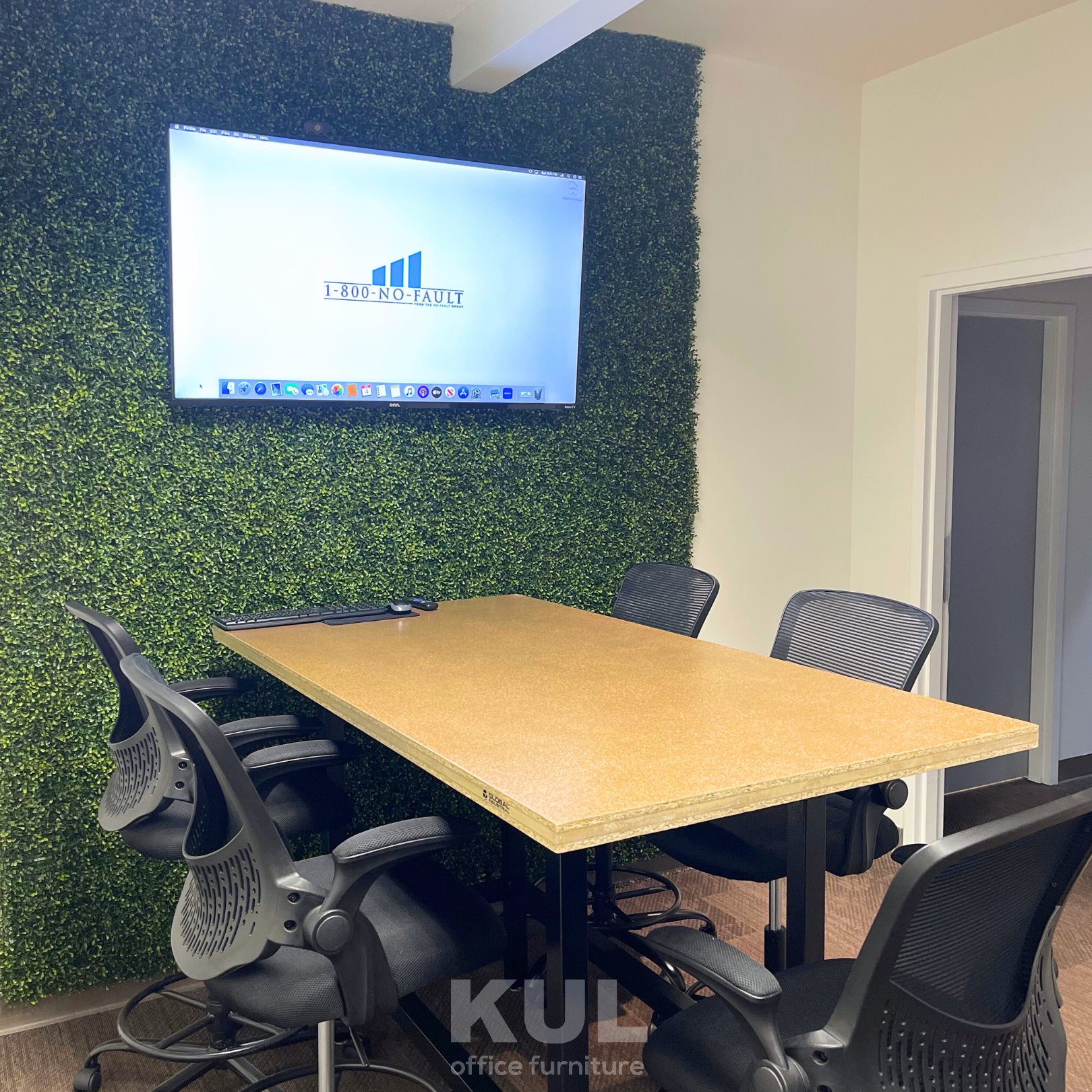 Meeting table with mesh back task chairs